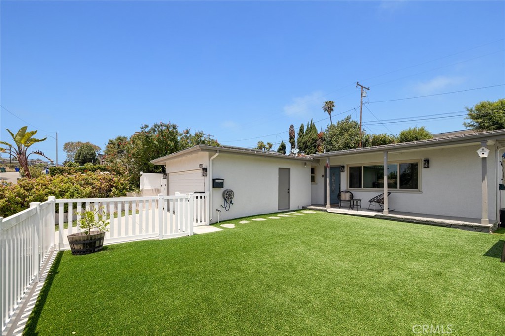 This beautifully remodeled single-story home, located near Pennekamp Elementary in the coveted Mira Costa section of Manhattan Beach, combines contemporary elegance with everyday livability. Completely renovated in 2022, it features a stunning contemporary kitchen with Bosch appliances, luxury plank flooring throughout, and an ideal floorplan with spacious living and formal dining areas. The primary suite is thoughtfully set apart from the other three bedrooms, bathroom, and laundry area, offering a sense of privacy and retreat. Fully fenced front and back yards provide private outdoor spaces to relax, entertain, or play. A 2-car garage plus driveway parking for two additional vehicles adds everyday ease. Located on a quiet street just moments from top-rated schools, parks, shops, and the beach, this is the move-in ready Manhattan Beach home you’ve been waiting for.