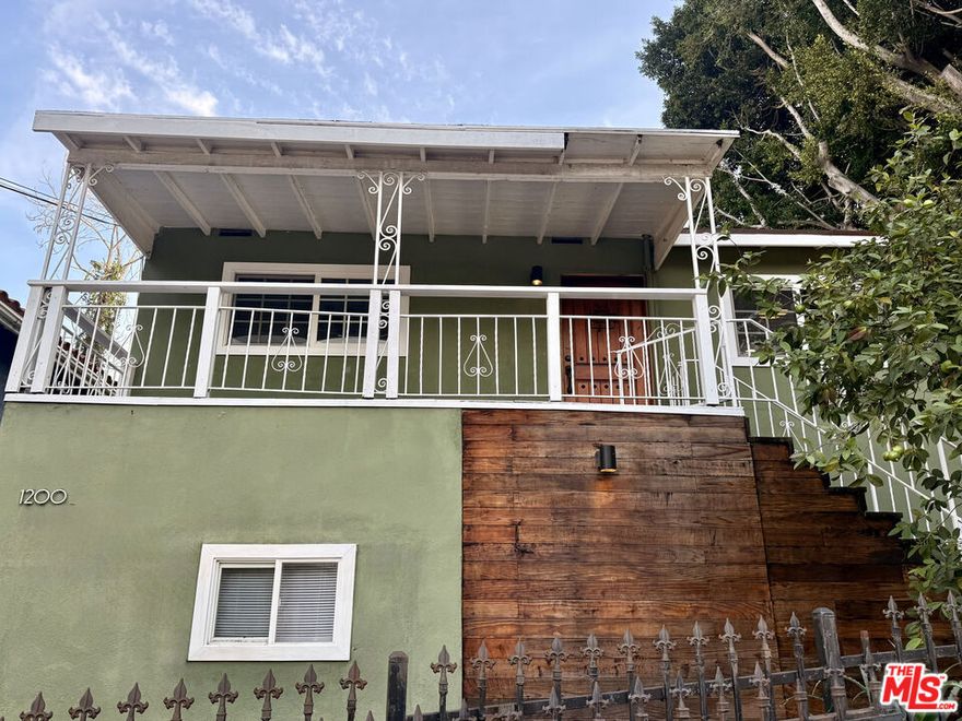 Prime 2 Bedroom House in Echo Park w/Gated Parking, Laundry, Outdoor Space + Office/Studio! Welcome to 1200 LaVeta Terrace a charming freestanding 2-bedroom, 1-bath home in the heart of Echo Park, complete with a versatile downstairs office/studio (with closet). Just blocks away from Echo Park Lake and the trendy bars, shops and restaurants along Sunset Blvd, this home offers the perfect blend of comfort, convenience, and city living. Enjoy hillside views from the second-level balcony, a modern kitchen with marble countertops and stainless steel appliances, and a spacious paved gated backyard ideal for outdoor dining, lounging, or additional parking. The home also features 2 parking spots, in-unit laundry, and central heat & AC for year-round comfort.