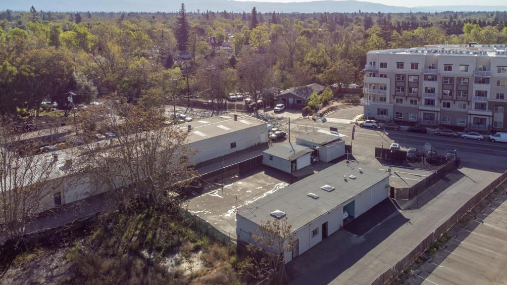 RARE INFILL DEVELOPMENT IN SILICON VALLEY 1856 Almaden Road offers a ±0.42 acre site newly zoned Urban Residential (UR), allowing 13-39 units by-right (3095 du/acre). Ideal for townhomes, apartments, or affordable housing, the site supports flexible unit types studios, 1 and 2 bedrooms designed to meet San Joses urgent housing demand. The current property is optimal for an owner user and/or collecting rental revenue. The layout and amenities are ideal for auto repair/ auto service tenants. Larger building consists of 3 units, all of which have roll up doors in the back and customer entrance doors in the front. All four units have full bathrooms and various size office spaces. Accepting offers through auction only, auction ends Mon August 11 at 12PM. Auction: bit.ly/1856AlmadenRoadAuction Approx. 2,320 SF of interior space between the four original units plus one garage structure (approx. 300 SF) added without permit by the previous owner. The approx. 18,205 sqft lot offers ample functional space including 25 regular parking stalls:13 inside the yard, 7 street parking, 5 in front of the larger building; up to 35-40 tandem. Approx. 90% of the blacktop was resurfaced in May 2025.