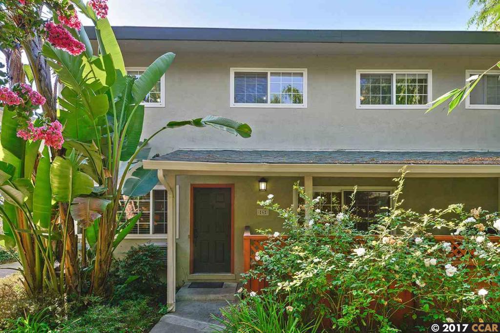 Situated in a beautifully maintained community, this spacious 3 bedroom, 2.5 bathroom end unit townhome offers a functional two-story floorplan. Top floor houses the bedrooms for privacy and downstairs features an open concept floorplan. The large kitchen with marble stone counter top & stainless steel appliances has side patio off the nook, perfect for cook outs & entertaining guests. Deeded parking is safely located in the gated carport. Enjoy the common pool & playground with friends & family. Located seconds away from the freeway, schools, transportation lines, and a whole array of shops & eateries. Don't let this charming townhome pass you by. Open Sat 9/9 & Sun 9/10 1-4pm
