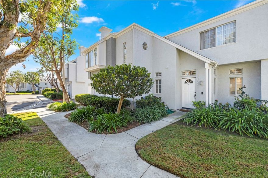 Tucked inside the gated community of Bridgeport Terrace, this stylish two-story townhome offers modern updates and a prime Laguna Niguel location. The neighborhood features just 48 residences surrounded by well-manicured landscaping and peaceful greenbelts. This 2-bedroom, 2.5-bath home with direct-access garage entry showcases 9-foot ceilings and a beautifully remodeled interior. The kitchen boasts white shaker cabinetry with soft-close doors, Calacatta Leon quartz countertops, a chevron glass backsplash, under-cabinet lighting, matte black hardware, and stainless steel appliances. The main level features luxury vinyl plank flooring, tall baseboards, and upgraded lighting, including a matte black chandelier in the dining area and a coordinating stairwell sconce. The living room centers around a cozy wood-burning fireplace and opens to a private patio with white vinyl fencing and direct access to the greenbelt, perfect for relaxing or entertaining. Upstairs, you’ll find two spacious primary suites, each offering its own ensuite bath and sizeable walk-in closet. A convenient main-level powder room and interior laundry area complete the home’s layout. Plus, there is an additional assigned parking space tucked conveniently behind the unit. Bridgeport Terrace residents enjoy gated access, a community pool and spa, plus BBQ and picnic areas. HOA dues cover basic AT&T cable, trash service, exterior maintenance, landscaping, and structure insurance. FHA and VA approved. Conveniently located near the 73 Toll Road, I-5, local shopping, dining, entertainment, Saddleback College, and just a short drive to beaches and Dana Point Harbor.