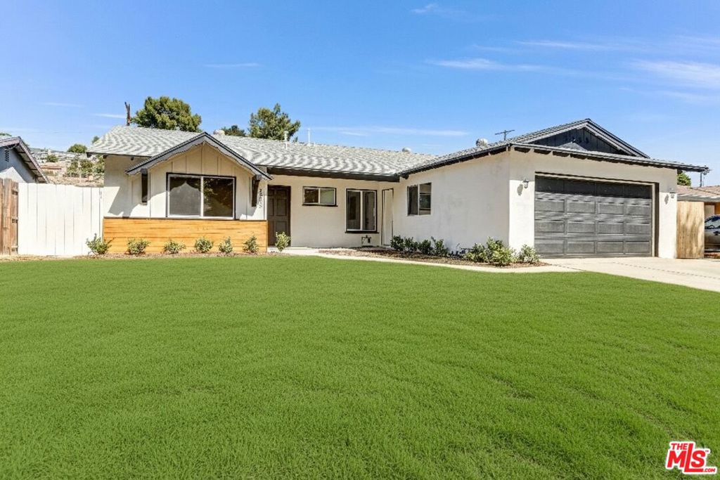 Located on a quiet, tree-lined street in the highly sought-after Valley Park neighborhood, this beautifully updated 3-bedroom, 2-bathroom home is in the heart of the Welby Way, Hale, and El Camino Charter school district. Designed for comfort and functionality, the home features a primary suite, nice sized bathrooms and a modern kitchen with white shaker cabinets stainless steel appliances, wine cooler and seating on the island perfect for everyday living and entertaining. The family room off the kitchen includes a cozy fireplace, with water proof laminate flooring throughout the house, recessed lighting and dual-pane windows for energy efficiency. Step outside through the new French doors to a private backyard oasis with a covered patio and grassy area. Major system upgrades include a new roof, new windows, newer sewer line, copper plumbing providing long-term peace of mind. This move-in-ready home blends charm, convenience, and quality in one of the Valley s most desirable communities.