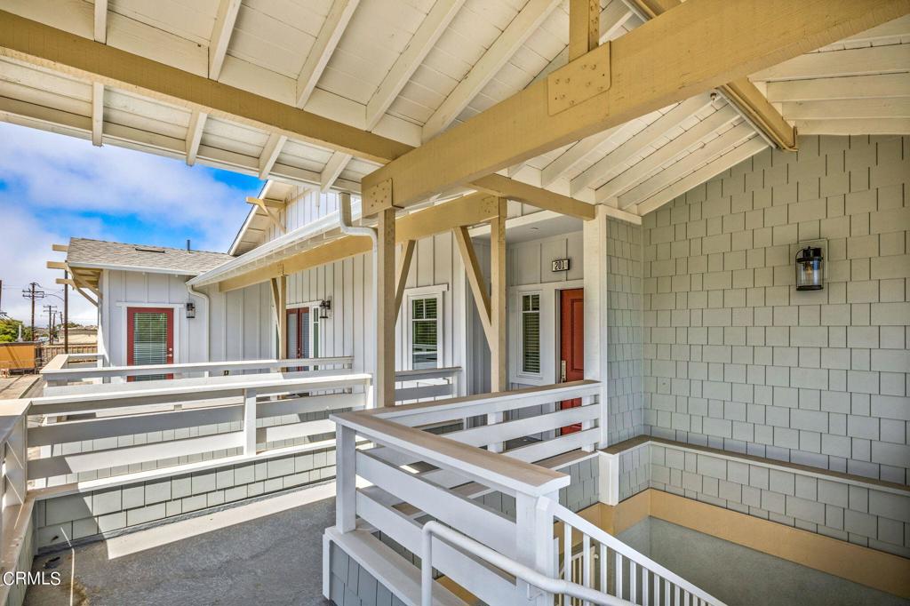 NOW OFFERED AT A NEW PRICE! LENDER INCENTIVES AVAILABLE! This home includes Luxury Vinyl Plank flooring throughout, which is an included upgrade. This is one of the two remaining, brand-new, never been occupied homes within the development. Home is upstairs, but all on one level once you travel up your own private staircase to the home. Welcome to Magnolia Court, a brand-new condominium development located in the heart of Oxnard's historic district. The architectural exterior design is Craftsman style, in line with the surrounding historical neighborhood. This unit is our ''Plan C'' condominium featuring three bedrooms and two FULL bathrooms, as well as a private 2 car garage located below. The open concept kitchen, dining and living areas feature vaulted ceilings and flow into a private patio, perfect for enjoying the sunset. Kitchen features white cabinets and a large island with white quartz countertops as well as stainless steel appliances including range, microwave and dishwasher. Built in desk near the kitchen area perfectly situated for working from home. Large main bedroom features a walk-in closet and an en-suite bathroom which includes dual vanity sinks, Delta branded fixtures and white sandstone quartz countertops. Additional standard features include high-quality Milgard windows and sliding glass doors used throughout, dedicated laundry room, recessed lighting in the kitchen, bathrooms and dining area, Smarthome technology throughout the home. Hurry - these final two units are being offered at an incredible price and are sure not to last long!