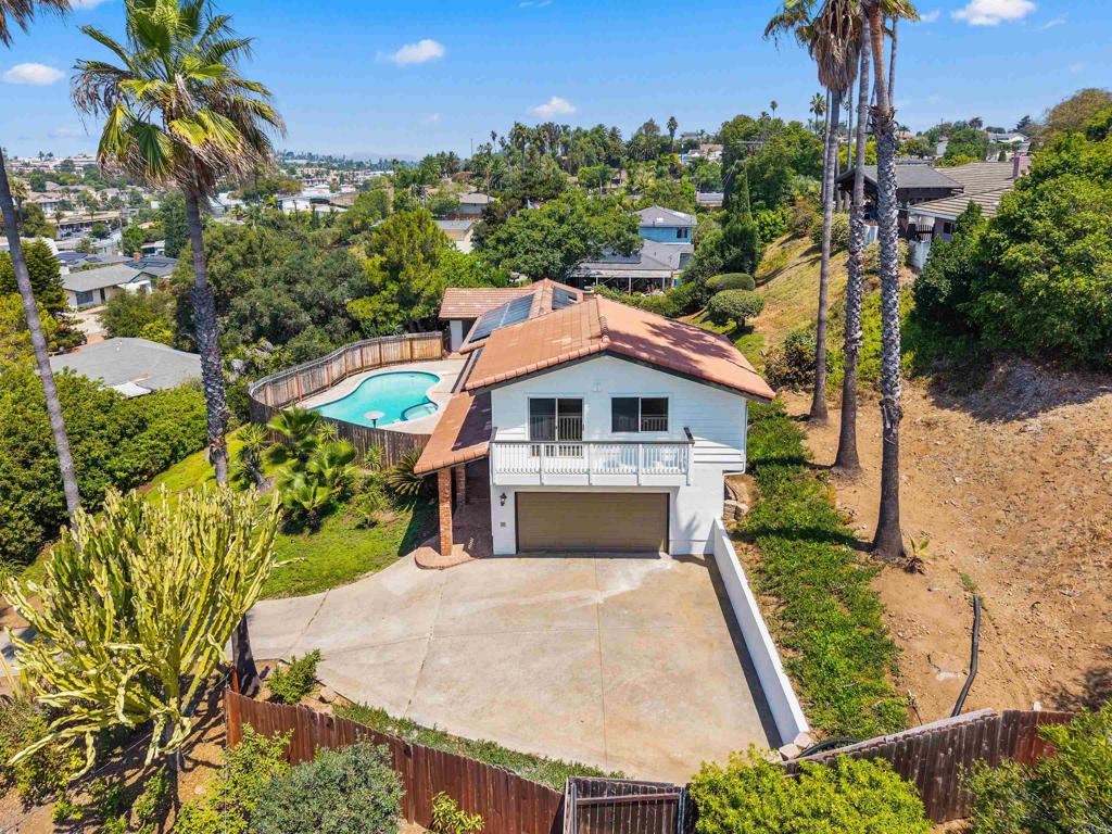 Welcome to 909 Donnan Place — a charming single-family home tucked away in the heart of Vista, CA. With 2,368 square feet of comfortable living space, this place is ready to be your family’s next chapter or a great investment to keep as a popular rental. It’s not every day you find a four-bedroom, four-bath home with two spacious primary suites — perfect for a growing family, multi-generational living, or hosting guests with ease. Step inside and you’ll notice how open and inviting it feels. The layout flows naturally from one room to the next, and windows fill the home with natural light all day long. With brand new flooring, a freshly painted interior, and a brand-new HVAC system, the space feels bright, clean, and comfortable year-round. The living area is big enough for get-togethers but still cozy enough for movie nights or quiet mornings with a book. The kitchen was recently updated and it shows — plenty of counter space, modern appliances, and lots of storage make it easy to cook and gather around. When you need a breath of fresh air, you can step out onto your private balcony to take in the view — the perfect spot for morning coffee or winding down at sunset. Outside, there’s even more to love. The backyard is your own private retreat, with a heated pool and spa that have been newly renovated and freshly resurfaced, ensuring years of enjoyment ahead. Whether it’s sunny days by the pool or warm evenings in the spa, relaxation is just steps away. There’s also luxury vinyl plank flooring throughout, a roomy two-car garage, and extra storage to help keep life simple and organized. You’ll love the location too — just a short distance to Brengle Terrace Park and close to all the restaurants, shops, and things to do in Vista. If you’ve been looking for a place that feels like home and gives you plenty of room to live, relax, and enjoy — this is it. Come see 909 Donnan Place for yourself — you won’t want to leave.
