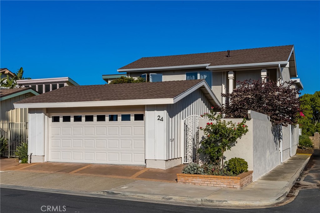 Stunning residence located in the heart of desirable University Park in a cul-de-sac. This exceptional home boasts a spacious layout w/ 4 bedrooms plus a versatile retreat/office off primary suite, along w/ 2.5 baths, all within nearly 2,700 square feet of meticulously designed living space & 3 outdoor living spaces. Gated front entry welcomes you to the garden court and patio area beyond. Double front entry doors open to formal entry area. Upon entering, you’ll find the family room that opens to the kitchen that sets the tone for warm gatherings w/ family & friends. The expansive gourmet kitchen offers a culinary haven of quartz counters, top-of-the-line stainless steel LG® appliances, vented hood, stylish custom backsplash, pull outs, display cabinets, floating shelves, breakfast bar seating, & undercabinet lighting. The inviting living room and dining room w/ bay window beckons w/ a cozy gas fireplace adorned w/ a stunning stone surround & hearth. From here, dual French doors open to discover a serene backyard oasis. The outdoor space is thoughtfully designed w/ seating area, decorative stone hardscapes, a dining area, drought friendly succulents, gate to access HOA greenbelt, & a variety of plant material & trees. Back inside, upstairs reveals a grand primary suite w/ fireplace, & a retreat/office. 3 sets of mirrored closets ensure ample storage. Retreat to the tranquil en-suite primary bathroom, which features a glass shower enclosure, dual sinks, floating vanity, live edge wood framed mirror, & ample linen storage. Three additional secondary bedrooms, one with a balcony off the front of the home. Highly upgraded hall bath w/ dual sinks, custom full height tile in the shower over tub, upgraded light fixtures, & a rain showerhead. Throughout enjoy recessed lighting, durable luxury vinyl flooring, upgraded baseboards, Kohler® sinks, Moen® sink fixtures, mirrored closet doors, Pella® windows, & custom window coverings. Dedicated laundry room with sink. 2-car garage w/ epoxy floors, recessed lighting, & in-wall heat & A/C unit. Just a short walk to University Park Elementary, University Community Park, Library, Adventure Playground, Mason Reg Park, & the community pool/spa. Minutes from nationally ranked University High School, UCI, Hoag, & beaches. University Park Village II offers 4 community pools & spas, 2 lighted tennis pavilions, 1 pickleball court, sports courts, 3 soccer fields, trails, parks, playgrounds, & picnic areas.