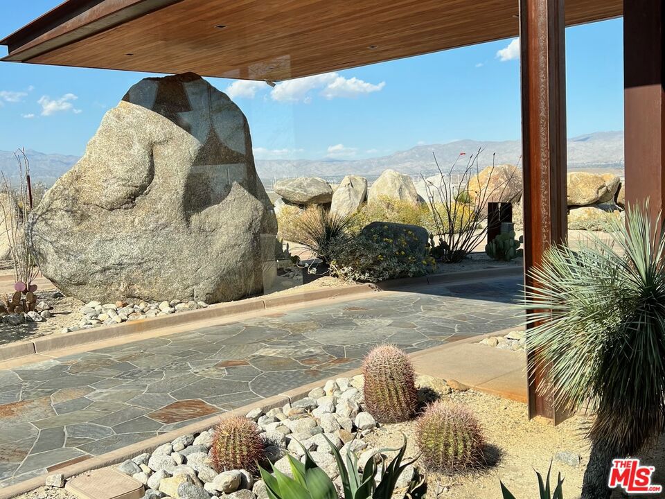Embrace the Visionary Elegance of Desert Palisades Lot 34 Discover the pinnacle of desert living in the illustrious Palm Springs with the unveiling of Lot 34, nestled in the prestigious hillside community of Desert Palisades. As the final bastion of its kind, this enclave marks a bold statement in modern architectural brilliance, offering a select few the chance to secure one of the 110 coveted home sites carved into the serene topography of Chino Canyon. A meticulous vision crafted over many years, Desert Palisades stands as the first residential sanctuary dedicated from its inception to upholding the principles of the iconic Mid-Century design. It's a homage to the era's quintessential aesthetic, blending seamlessly with the unspoiled desert backdrop. Lot 34 invites you to engage with the world's most venerated architects to compose a home that epitomizes your taste for sophistication and innovation. The building guidelines are not just rules but a source of inspiration, allowing you to channel your unique narrative into a magnificent architectural tapestry. With its commitment to the Mid-Century ethos of design and location that is as picturesque as it is prestigious, Lot 34 is more than a plot of land; it's a canvas for your avant-garde architectural expression. Seize this opportunity to craft your piece of architectural history within the desert's last hillside enclave.