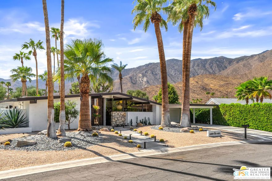 Recently featured in Palm Springs Life Magazine and The New York Times, and chosen for the 2025 Modernism Week Signature Home Tour, this mid-century modern gem is situated in South Palm Springs' highly sought-after Indian Canyons neighborhood. Built in 1963 as a model home and thoughtfully expanded, it now spans nearly 4,000 square feet on a spacious 1/3-acre lot bordering the Indian Canyons Golf Course. Over the last four years, it has been updated to highlight sweeping mountain views and seamless indoor-outdoor living. Interiors feature a dramatic entry, open living area, built-in bar, and a wall of sliding glass doors to the backyard. The reimagined chef's kitchen includes custom cabinetry, designer tile, and premium Dacor and Miele appliances. Recent upgrades include three HVAC systems, dual-pane windows, an updated electrical panel, automatic window shades, plus vibrant paint and wallpaper. Outdoor enhancements include two fire pits, a pergola dining area, a built-in BBQ, an outdoor shower, a freshly re-plastered pool, a new foam-coated roof, and lush landscaping. With room for a casita or extra garage, and golf cart parking, this home blends classic design with modern ease.