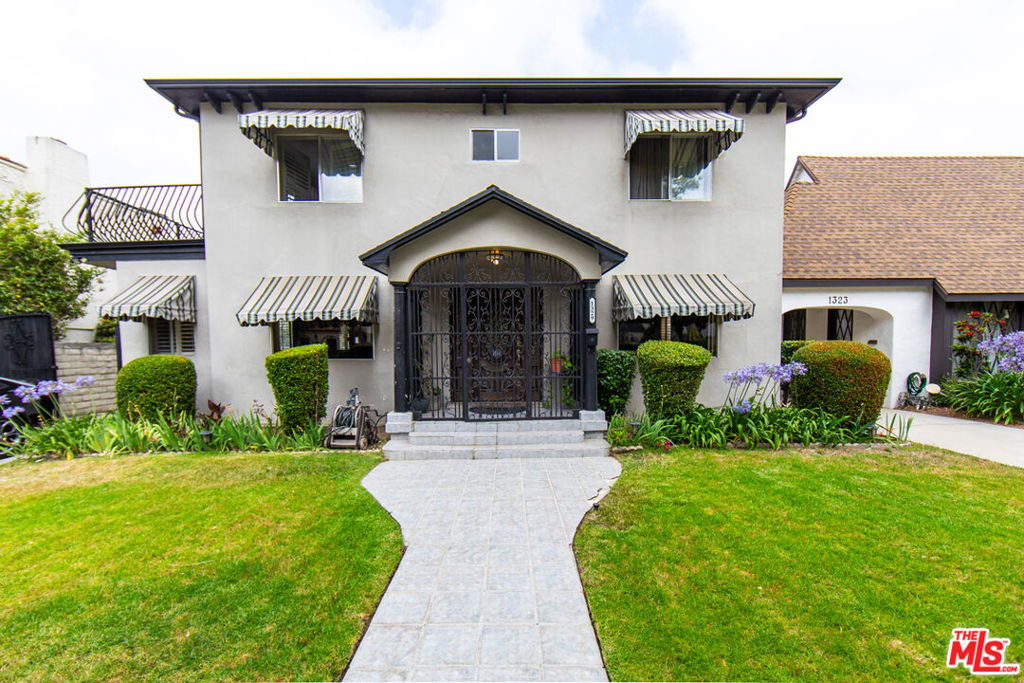 Welcome to 1329 S Genesee Ave, a stunning single-family residence with classic charm and modern-day conveniences. This spacious home offers 3,042 square feet of living space. As you step inside, you are greeted by a charming entry that connects the living areas, creating an ideal setting for both everyday living and hosting gatherings. The cozy kitchen is equipped with modern appliances and counter space, making meal preparation a breeze. Adjacent to the kitchen, the dining area offers a perfect spot for enjoying meals and creating unforgettable memories. The primary suite features a spacious layout and an en-suite bathroom. The additional bedrooms are equally impressive, offering comfort and flexibility for guests or office space . Located in the Mid-Wilshire section of Los Angeles, this home provides convenient access to a variety of dining, shopping, and entertainment options. Don't miss the opportunity to make this exquisite residence your own.
