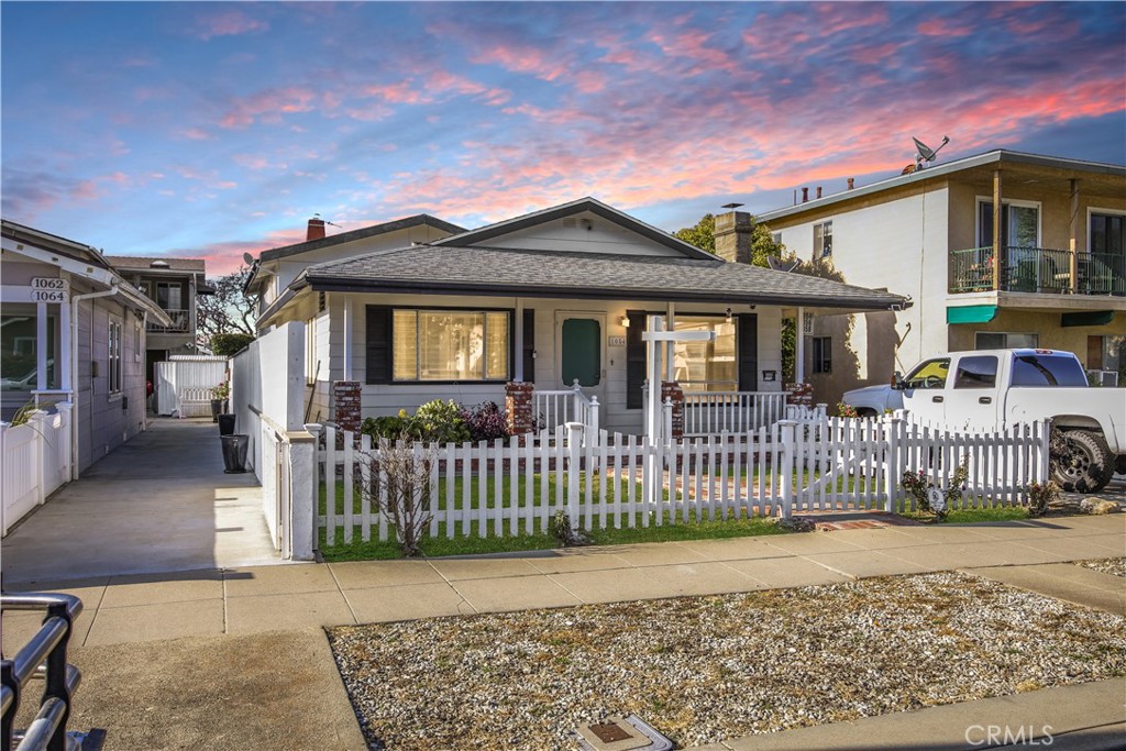 Discover an exceptional investment opportunity at 1054 W 23rd St in the vibrant San Pedro, CA. This captivating four-unit property blends historical elegance with contemporary functionality. It features a charming 2-bedroom/1-bathroom front house complemented by three meticulously renovated 1-bedroom/1-bathroom units at the rear. Recent enhancements, exceeding $150,000, include complete renovation to all rear units, installation of new water heaters and modern appliances, termite tenting completed in May 2023, fresh exterior paint, new vinyl gates, new garage and revamped property drainage system. Strategically situated in an area witnessing a $100 Million Dollar waterfront development - West Harbor, this property is poised for significant appreciation. The development promises to enhance the locale with new entertainment and dining venues, along with breathtaking views of the bustling activities at the country’s largest port. This is a rare chance to be part of San Pedro’s exciting real estate transformation. Seize the opportunity to own a piece of this dynamic community.