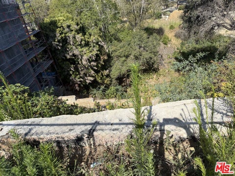 Photo of 838 N Las Casas Avenue, Los Angeles, CA 90272 (MLS # 26987443)