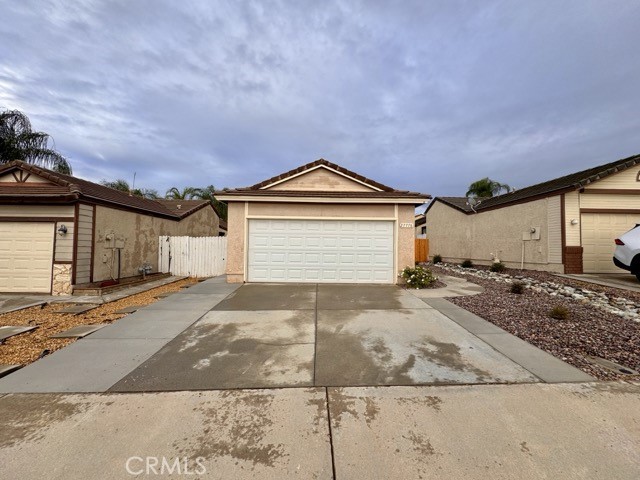 Welcome to this beautifully updated single story home offering 2 bedrooms, 2 bathrooms, and 927 square feet of comfortable living space located in Menifee. This home features a bright, open layout with modern finishes throughout. The kitchen has been tastefully remodeled with crisp white cabinetry, quartz countertops, recessed lighting, and stainless steel appliances. Both bathrooms are stylishly updated with contemporary fixtures and clean design. The upgraded plank flooring throughout ties the space together with warmth and modern appeal. Enjoy the low maintenance front yard and a private fenced backyard, great for relaxing or entertaining outdoors. Please note, the two car garage is not available for tenant parking. A small portion of the garage is provided for storage use only, and the homeowner maintains private, separate access to the remainder of the garage. Tenants have access to park in the driveway. Conveniently located near shopping, dining, and easy freeway access, this move in ready home is perfect for those looking for comfort and convenience in a quiet neighborhood. Schedule your showing today!