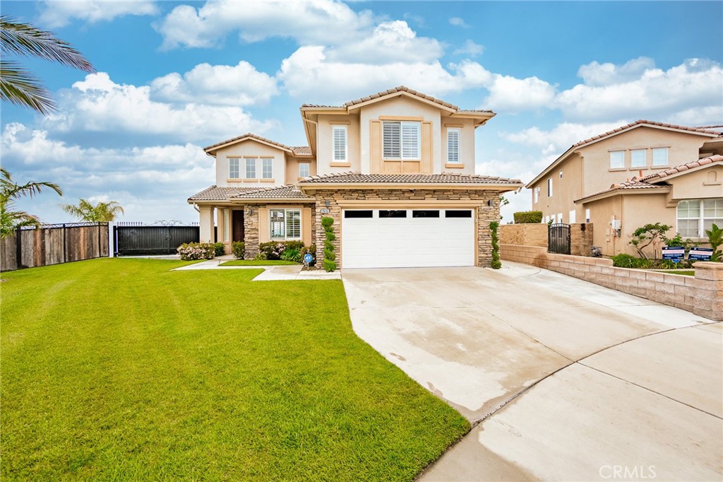 Welcome to this exquisite property situated in the prestigious Sierra Del Oro neighborhood adjacent to Yorba Linda. This stunning home boasts unobstructed 180-degree views of the city lights and mountains, offering a serene and peaceful setting that is perfect for those seeking relaxation and tranquility. As you enter the home, you'll be greeted by the elegant 24"x47" glossy tile floors that flow throughout the first floor, including a remodeled downstairs bathroom. The downstairs office's custom shelves and glass doors make it the perfect space for working from home. The contemporary kitchen--complete with Quartz countertops, breakfast bar, and island-- opens to the cozy family room, making it ideal for hosting gatherings. The remodeled fireplace adds a touch of warmth to the room and creates a relaxing ambiance. The primary bedroom is a true oasis with its luxurious bathroom, featuring a freestanding jetted tub and wall-to-ceiling tile shower walls. The private balcony off the primary bedroom provides unbelievable views, making it the perfect spot for enjoying a cup of coffee or a glass of wine. The backyard of this stunning property is a true outdoor oasis, fully landscaped with a covered patio and plenty of space for outdoor entertaining. With the addition of clear glass fences, you can enjoy unobstructed and breathtaking views of the city lights and mountains while you relax and entertain. You'll also find a Tandem 3-car garage with EV Charging, as well as convenient parking for recreational vehicles, allowing you to enjoy all your favorite outdoor activities with ease. And that's not all, this home also features a 5th bedroom that can be used as a game room, given its massive size, adding even more entertainment options to this fantastic property. This home's location is unparalleled, offering seamless accessibility to Orange County's vibrant offerings and to the nearby expansive tracts of preserved open space, including the famed Skyline trails. The possibilities for exploration and adventure are endless, with major transportation arteries nearby, including the 91 Freeway, 241 Toll Road, and Metrolink. Move-in date is September 26 or later. Schedule a tour today and discover why this home is a true dream come true.