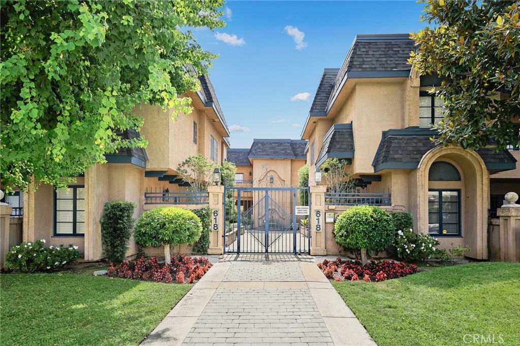 Beautifully updated 2-bedroom, 2.5-bath townhome offering 1,740 sq. ft. of living space in a secure gated community in Arcadia. Located in one of the best spots in the complex, this unit opens to the courtyard and features a large private patio. Interior upgrades include fresh paint throughout, new flooring on the first floor, and new carpet on the stairs and second floor. The main level offers a spacious living room with fireplace, a bright kitchen with stainless steel appliances, and dining area with direct access to the patio. Upstairs, the primary suite includes a walk-in closet and en-suite bath, with an additional generously sized bedroom and full bath. Additional features: in-unit laundry, two assigned subterranean parking spaces, and a private storage room. HOA includes water, trash, landscaping, and maintenance of the common areas, offering a low-maintenance lifestyle in one of Arcadia’s most desirable neighborhoods. The roof and fascia were recently replaced. Move-in ready and conveniently located near shopping, dining, and local amenities. Don’t miss this rare opportunity!