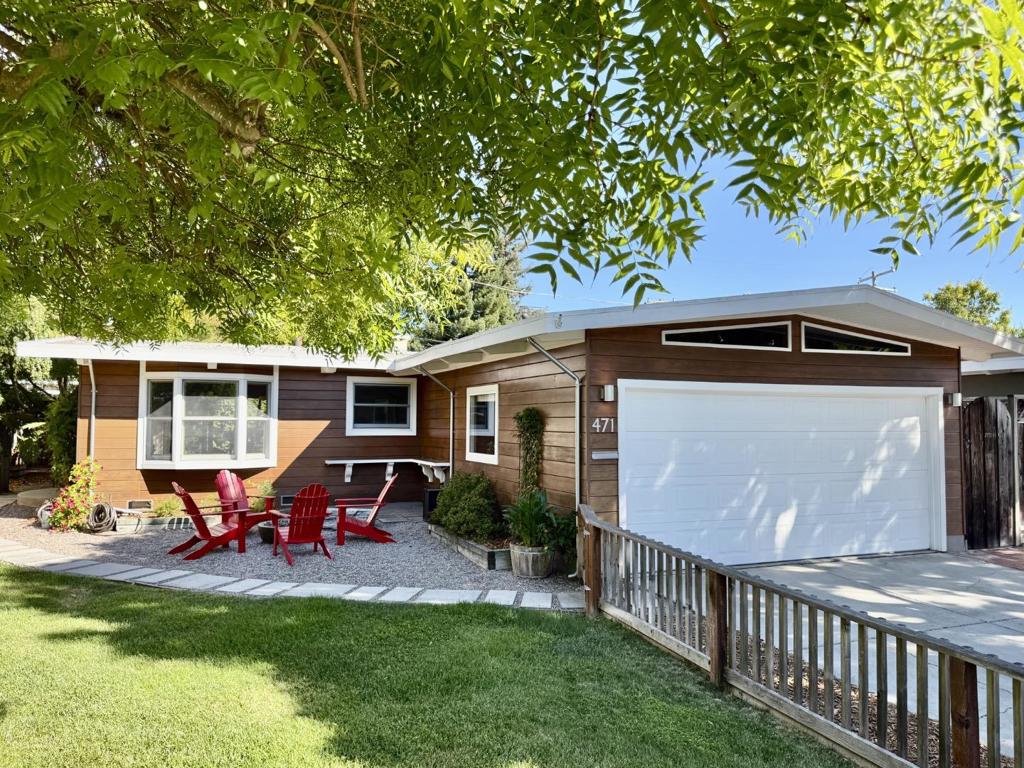 Pride of ownership exudes from this beautiful, turn-key home in the sought after Monta Loma neighborhood. A welcoming front yard offers a relaxing oasis with soothing fountain and built in gas fire pit for evening entertainment. Inside, a light and bright, freshly painted interior boasts an open floor plan, with vaulted, wood beam ceilings, and refinished wood floors. Timeless kitchen and bathroom updates. 3 bd/2 ba including primary en suite, plus custom built Murphy bed, desk, and bookshelves . Fresh landscaping with auto timed sprinklers. Spacious two car garage with large washer/dryer, and abundant built in storage - a must see!