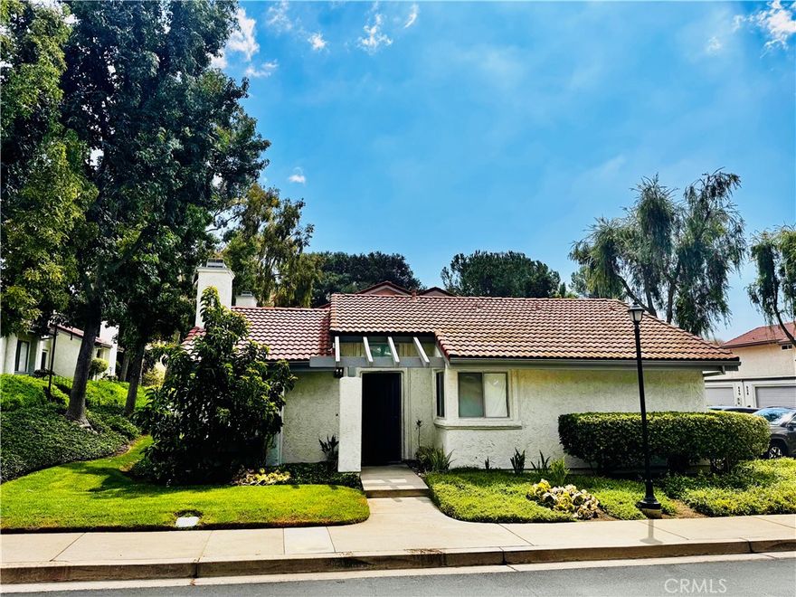 Don’t miss this single-story, standalone unit in the heart of Oak Park! With no common walls, backyard space, and direct access to a spacious two-car garage, this home lives like a private single-family residence. Featuring 2 bedrooms and 2 baths, it blends privacy and comfort living in a prime location.

Inside, the open layout showcases vaulted ceilings, a cozy fireplace, and a bright, updated kitchen with stainless steel appliances, perfect for both everyday living and entertaining. The primary suite features a private bath and a spacious closet, while the second bedroom opens directly to the patio, making it ideal for guests or a home office.

Step outside to enjoy your own backyard patio, oversized garage, and a sparkling community pool, all just minutes from parks, scenic trails, and award-winning Oak Park schools.