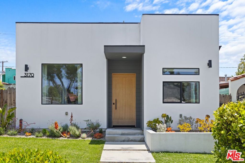 Recent New Build: 3+2 Home with Vacant 2+1 ADU/Guest House in Atwater Village. Discover this modern Spanish bungalow, nestled on a picturesque tree-lined street in the highly desirable Atwater Village neighborhood of Los Angeles. This property offers a unique blend of contemporary living and classic charm, featuring a 3-bedroom, 2-bathroom main house and a separate 2-bedroom, 1-bathroom ADU/guest house. The main house is filled with natural light, showcasing an open-concept living space that seamlessly connects to the stylish kitchen. Equipped with stainless steel appliances, a center island, and an inviting dining area framed by large picture windows "perfect for entertaining." Two additional bedrooms provide ample space for family, guests, or a home office. Plus, a bathroom and connecting closet that offers a stackable washer/dryer. Enjoy a generous primary suite with a walk-in closet and en-suite bathroom. Just outside is a cozy patio and a spiral staircase to a rooftop deck with sweeping views of Griffith Park and the surrounding mountains. A two-car garage with gated access from the rear and generous storage space. The Guest House/ADU located behind the main house, this vacant 2-bedroom, 1-bath unit features a kitchen, dining, and den area. It is ideal for use as a guest house, office/creative space, or rental unit. Experience the vibrant community lifestyle with trendy boutiques, popular cafes, and the local favorite, the Sunday Farmers' Market. This property combines modern amenities with the charm of one of LA's most sought-after neighborhoods. Don't miss the opportunity to make it your own! Easy to show!https://calendly.com/plreteam/3170-glenmanor-place