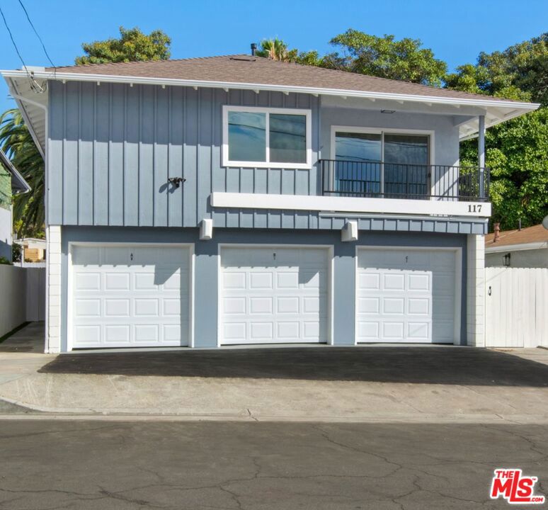 Discover coastal living in this boutique triplex. Be the first to live in this meticulously renovated, two-bedroom, two bath. Every detailed has been crafted to enjoy modern day necessities. Brand new appliances, fixtures, flooring. Custom design finishes. Private Garage, balcony, fireplace, washer and dryer. Situated a mere half a mile from the beach, providing access to sand when the mood strikes. This is more than just a home, this is a lifestyle.