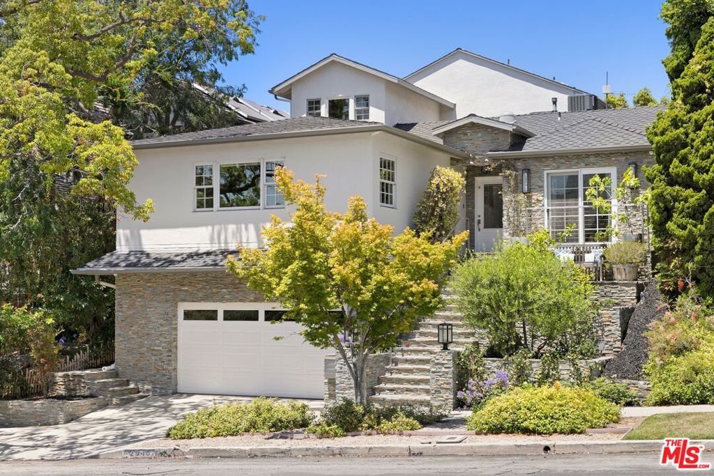 Stunningly updated residence in the heart of coveted Cheviot Hills. This spacious two-story home offers 4 expansive bedrooms, each with its own ensuite bath, and a perfectly designed light-filled open-concept layout that effortlessly blends indoor elegance with outdoor ease. At the heart of the home, a gourmet kitchen showcases a striking marble island, top-of-the-line appliances, and custom cabinetry, flowing seamlessly into expansive living and dining area accented by wide-plank wood flooring. Upstairs, the luxurious primary suite impresses with vaulted ceilings, a private balcony, and a spa-inspired en-suite bath featuring dual vanities and a generous walk-in steam shower. Step outside to your private backyard oasis complete with a sparkling pool and spa, covered patio, outdoor kitchen, and lush, low-maintenance turf perfect for effortless entertaining year-round. Located within the highly sought-after Overland Avenue Elementary school district and just moments from the Griffin Club, as well as premier dining, shopping, and everything the Westside has to offer!