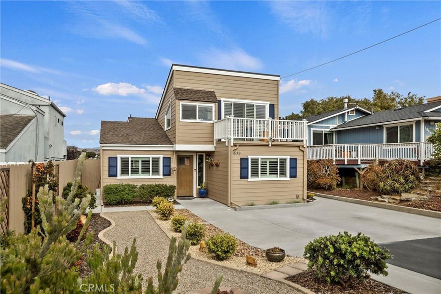 Welcome to this beautifully maintained, move-in ready home in the heart of Los Osos, just moments from the bay and boasting views of the beloved Morro Rock, the dunes, and the bay. This 3-bedroom, 2-bathroom gem offers thoughtful, quality upgrades throughout.

Downstairs, you'll find all three bedrooms—including a serene master suite—both bathrooms, kitchen and a dedicated laundry nook, offering convenient single-level living. Upstairs, the light-filled living space with high ceilings and a cozy gas fireplace opens to a deck with breathtaking views, creating an airy and inviting atmosphere.

The fully upgraded kitchen features quartz countertops, single basin sink, more high ceilings, soft-close cabinetry, bi-fold corner cabinets, pull-out’s including trash and recycle, for both beauty and functionality. Bathrooms have been tastefully renovated to match the rest of the light and bright feel, and the home is adorned with elegant wood flooring.

The spacious backyard is a tranquil retreat, meticulously landscaped with low-maintenance, drought-tolerant plants. A 10x12 storage shed/workshop with 240V power adds flexibility for hobbies, projects, or extra storage.

Additional highlights include a one-year-old seller-owned solar system with battery backup, two-year-old roof, and many more.

Live minutes from hiking trails, kayaking spots, golf courses, dining, and the charming Baywood Park, as well as shops and schools. This home is only 5 miles from the popular destination of Morro Bay. You will also enjoy convenient access to Highway 1, making it easy to explore the Central Coast’s scenic towns.

This stunning home offers the perfect blend of modern comfort, efficient living, and unbeatable location. Don't miss the chance to make it yours!
