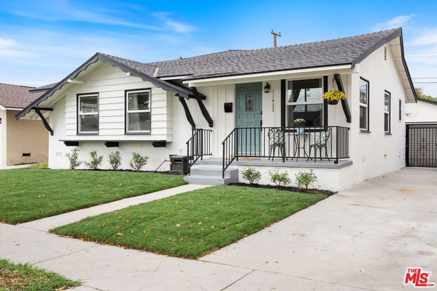 Welcome to 11433 214th St, Lakewood!  This freshly painted Mid-Century Ranch-style home with cottage influences offers 3 bedrooms, 2 bathrooms, and a blend of timeless character and modern comfort. The inviting front porch and unique etched-glass dual-pane windows set the tone for a home filled with charm and thoughtful details. Inside, discover an open-concept addition with a large grand room featuring an updated kitchen, dining area, and spacious family room anchored by a cozy gas stone fireplace. The seamless layout is perfect for entertaining or relaxing at home. The primary suite is a true retreat, complete with its own gas fireplace and a spa-like bathroom boasting a 2-person jetted tub and dual vanity.  Additional highlights include a separate laundry room, detached 2-car garage, and a generously sized backyard ideal for outdoor gatherings, gardening, or play. This neighborhood is a rare gem for anyone who values outdoor living and convenience. Just a short stroll away, you'll find Rynerson Park and Home Run Dog Park 40 acres of open space with bike and walking trails, picnic spots, and baseball diamonds. Mae Boyar Park is also nearby, offering playgrounds, basketball courts, and plenty of room to relax or play. You're also close to the Lakewood Center, the West San Gabriel River Nature Trail, and the San Gabriel River Bike Path plus only about a 10-minute drive to the beach.Situated on a quiet street in a prime location near schools, parks, shopping, and dining, this Lakewood gem combines style, comfort, and convenience in one incredible package.