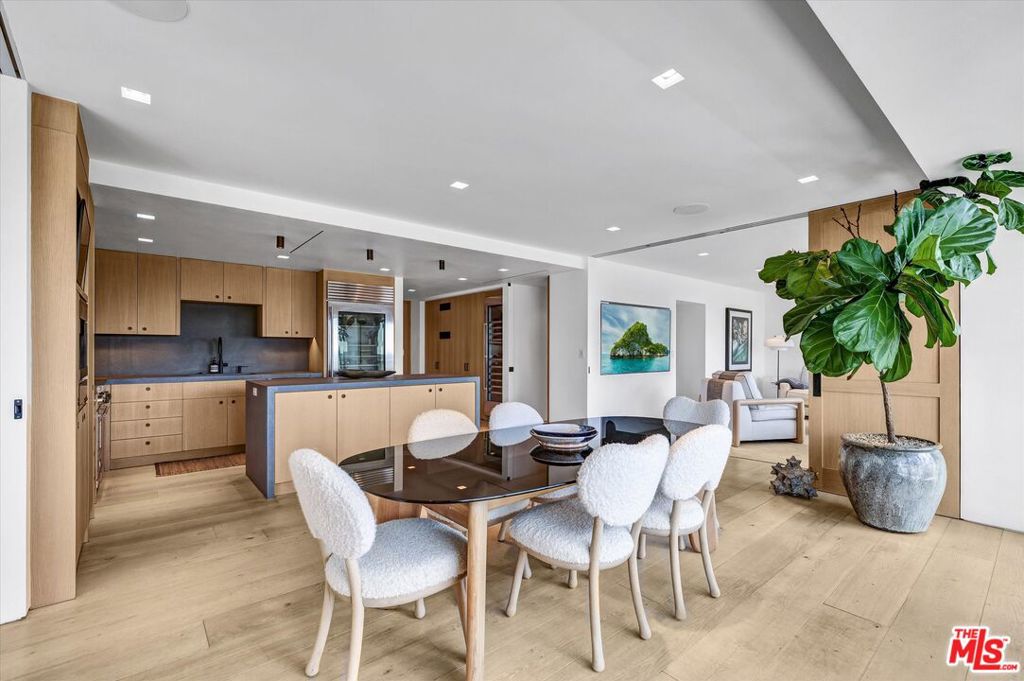 A rare opportunity to lease one of the five penthouses at the prestigious Doheny West Towers. This stunning, fully furnished west-facing, two-bedroom, two-bathroom unit features explosive city and ocean views. The chef's kitchen features stainless steel appliances, custom white oak cabinetry, wine storage, and stone countertops and opens to the formal dining area. The primary suite features custom built-ins, a generous walk-in closet, and a bathroom with a dual vanity featuring silver travertine countertops and a walk-in shower. The den/2nd bedroom features sliding oak doors with an adjacent full bathroom. Fleetwood doors from each living space open to the unique 40+foot balcony that showcases the unobstructed city and ocean views and is perfect for watching the sunsets and entertaining. There are also custom shades throughout, trimless designer lighting, state-of-the-art A/V, and a washer/dryer inside the unit. The full-service building recently completed an $8M+ renovation and has a 24-hour concierge/doorman, security, complimentary valet for guests, saltwater pool, gym, sauna, and laundry facility. The unit comes with one assigned parking space. No pets are allowed, and this is a non-smoking building. It is located in the trendy West Hollywood/Beverly Hills area, with close access to some of the best restaurants, shops, and hotels.
