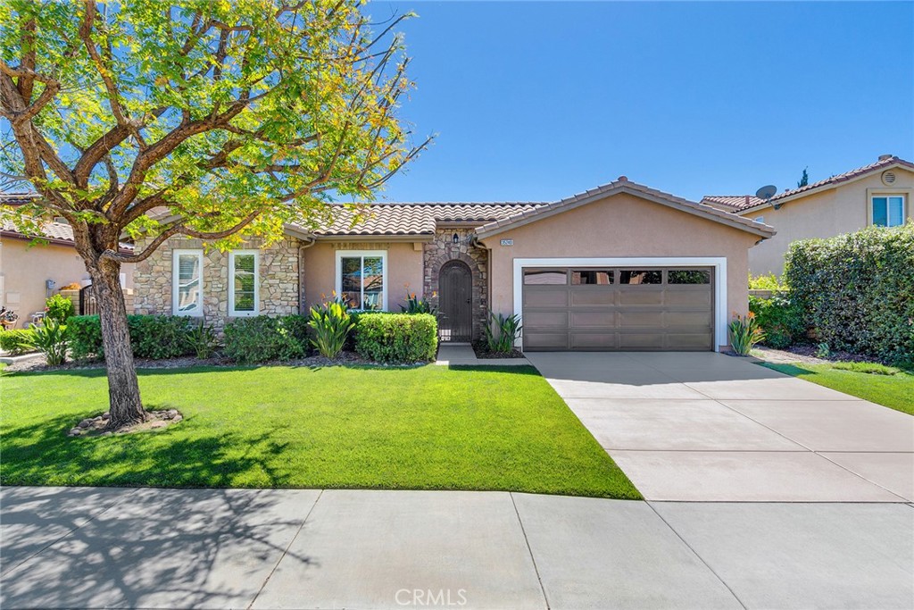 Look no further—this is the one!
Welcome to 35240 Via Santa Catalina, a beautifully maintained single-story home in the heart of French Valley, just minutes from Temecula Wine Country and top-rated schools.
This sought-after home offers 4 bedrooms, 2.5 bathrooms, and 2,081 sq ft of thoughtfully designed living space on a 6,969 sq ft lot—with the added bonus of potential RV parking!
From the moment you arrive, the curb appeal stands out with lush professional landscaping, a freshly coated driveway and walkway, and a gated, enclosed front courtyard that provides an additional 288 sq ft of private outdoor living—perfect for greeting guests or enjoying quiet mornings.
Inside, a grand foyer with a decorative tile medallion welcomes you into a stylish and functional layout. The gourmet chef’s kitchen is a showstopper with upgraded cabinetry, exotic granite counters, stainless steel KitchenAid appliances, and a spacious island ideal for everyday living or entertaining. The open-concept design connects seamlessly to the inviting main living area, complete with recessed LED lighting and a freshly painted gas fireplace.
Custom tile flows throughout the primary living areas, while plush new carpet in the bedrooms adds warmth and comfort. The formal dining room impresses with elegant wainscoting, a leaded glass window, crown molding, and updated lighting, creating a sophisticated yet cozy ambiance.
The generously sized bedrooms each feature new ceiling fans, and the bathrooms are upgraded with quality finishes, granite countertops, and stylish tile. The primary suite is a true retreat with a walk-in closet, dual vanities, soaking tub, and walk-in shower.
Step outside to your private, low-maintenance backyard oasis—fully hardscaped and surrounded by mature, arborist-maintained trees including Tipuana Tipu, Fruitless Olive, Pomegranate, Palo Verde, and more. Enjoy outdoor dining under the covered patio with a built-in natural gas BBQ and soak up the serene, sunny SoCal lifestyle.
Additional features include: newer hot water heater, rain gutters, new toilets, integrated LED lighting, upgraded fixtures, and a recently coated courtyard and driveway.
Move right in and start enjoying the best of SoCal living!