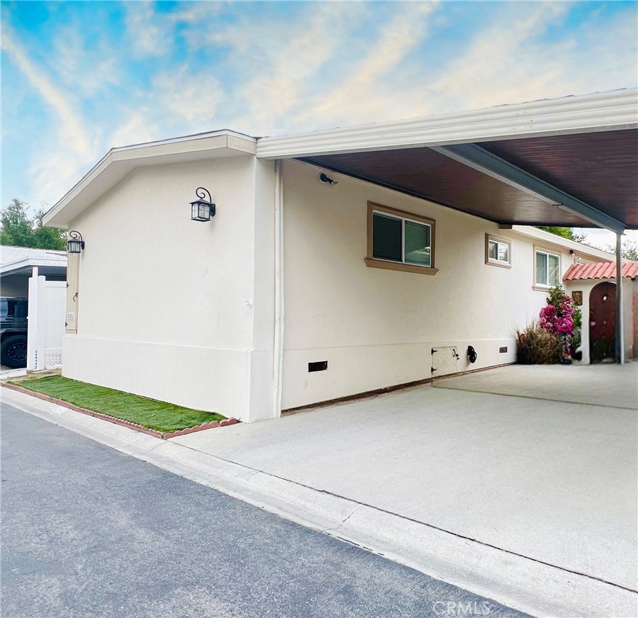 WELCOME HOME! LOCATED IN THE EXCLUSIVE NEIGHBORHOOD OF CALABASAS VILLAGE. THIS AMAZING MANUFACTURED HOME HAS A SPACIOUS DECK WITH ENCHANTING BREATHTAKING VIEWS OF NATURE TO ENJOY YOUR MORNING SUNRISE AND SUNSETS. This property features three bedrooms, ONE OFFICE, two bathrooms with granite counter tops. A beautiful Kitchen with high-end stainless steel stove, dishwasher, and granite counter tops. Recessed lights throughout, tile floors and wood shutters. Plenty of natural light, A spacious living room, dining room, laundry room, stucco and a custom shed. NO PROPERTY TAXES! CALABASAS ACADEMY AWARD WINNING SCHOOL LAS VIRGENES DISTRICT. Plenty of nearby HIKING AND BIKING TRAILS. Calabasas Village amenities include a pool, spa, gym, sauna, tennis court, basketball court, doggie park, clubhouse, gourmet kitchen, business room, library, kids play area, BBQ area. LOCATED JUST MINUTES FROM MALIBU AND PCH/HWY. THE PRESTIGIOUS CALABASAS COMMONS WITH SHOPPING STORES, RESTAURANTS, AND MOVIE THEATER. CLOSE BY WESTFIELD TOPANGA PLAZA. COME AND ENJOY THE RESORT LIFESTYLE!