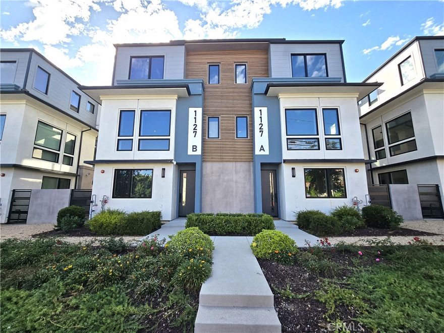 Luxurious brand-New Tri-Level Condo in the heart of Arcadia! This thoughtfully designed home offers the perfect balance of modern amenities, elegant finishes, and a prime location. Spacious Living Area,3 bedrooms and 3.5 baths, Private Elevator, Enjoy the convenience of elevator access to all three levels. The second floor boasts a spacious kitchen with a center island, quarts countertops, Custom built-in appliances, and a walk-in pantry. The kitchen seamlessly flows into the dining area and separate living room. The top floor features a large primary suite with a walk-in closet, dual sinks, and a walk-in shower. Equipped with owned solar panels, and an EV charging-ready 2-car garage. The First floor includes a bedroom ensuite and laundry closet. Prime Arcadia location near shops, restaurants, highly rated Arcadia school District. Thís new construction offers a blend of luxury, convenience and sustainability in one of Arcadia's most desirable neighborhoods.