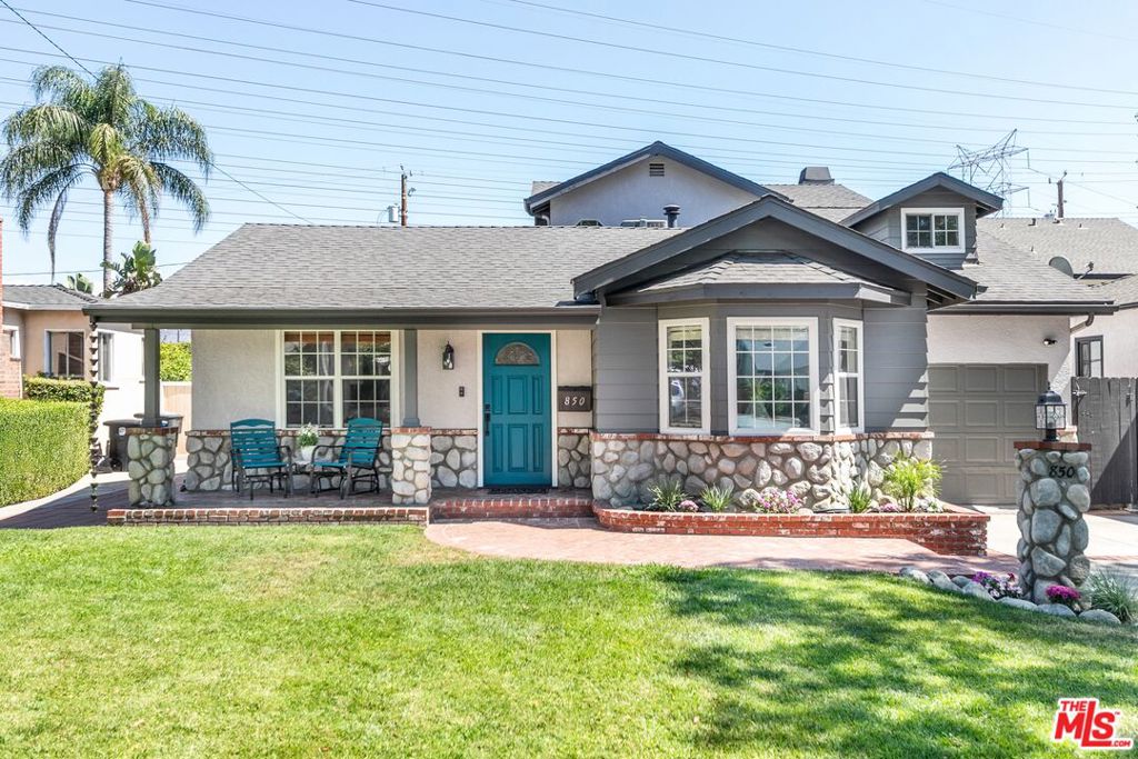 Charming throughout and beautifully maintained, this spacious Craftsman style home located in the highly desirable Magnolia Park neighborhood is not to be missed! In addition to the 2,780 SF of main living space, which features 4 bedrooms and 3 full baths; there is also a separate recreation room/workshop (about 359 SF) with a half bath offering many possible uses. As you approach from the tree-lined street, you are greeted by a grassy landscaped yard, winding brick walkway, and charming covered porch. Enter the home into a light and bright living room that flows seamlessly into a stunning remodeled kitchen, complete with stainless steel appliances, granite countertops, modern pendant lighting, and a breakfast bar. The kitchen opens to the dining area and huge family room featuring a cozy fireplace. Additionally on the first floor, there are two full baths; a laundry room - washer and dryer are included; two very large bedrooms with tons of closet space; and a third bedroom, which is currently being used as an office. The entire second floor is a primary suite, featuring a spacious bedroom with vaulted ceilings; a spa-inspired bathroom with soaking tub, dual sinks, and separate shower; a massive walk-in closet; and a private balcony perfect for relaxing and enjoying mountain views. The backyard is truly an entertainer's oasis - private and landscaped with a large patio lending to relaxing, grilling, dining al fresco, and playing. In addition to the ample cabinetry and closet space, this home has so much extra storage! In the garage there is a pull-down ladder accessing a loft (about 160 SF); behind the recreation room/workshop, there are two storage closets (about 62 SF in total); in the backyard there is a storage shed (about 120 SF); and there's a huge attic area with even more storage space. Home has great flow and many updates throughout. Some of the updates include a newer cool roof 2025, newer dual HVAC systems 2024 & 2021, newer exterior paint 2025, gleaming engineered hardwood flooring, copper plumbing, upgraded carpet, and dual pane windows. Home is in a well-loved neighborhood with a fantastic location - close to major studios, freeways, Magnolia Blvd shops & restaurants, Toluca Village, and NoHo!