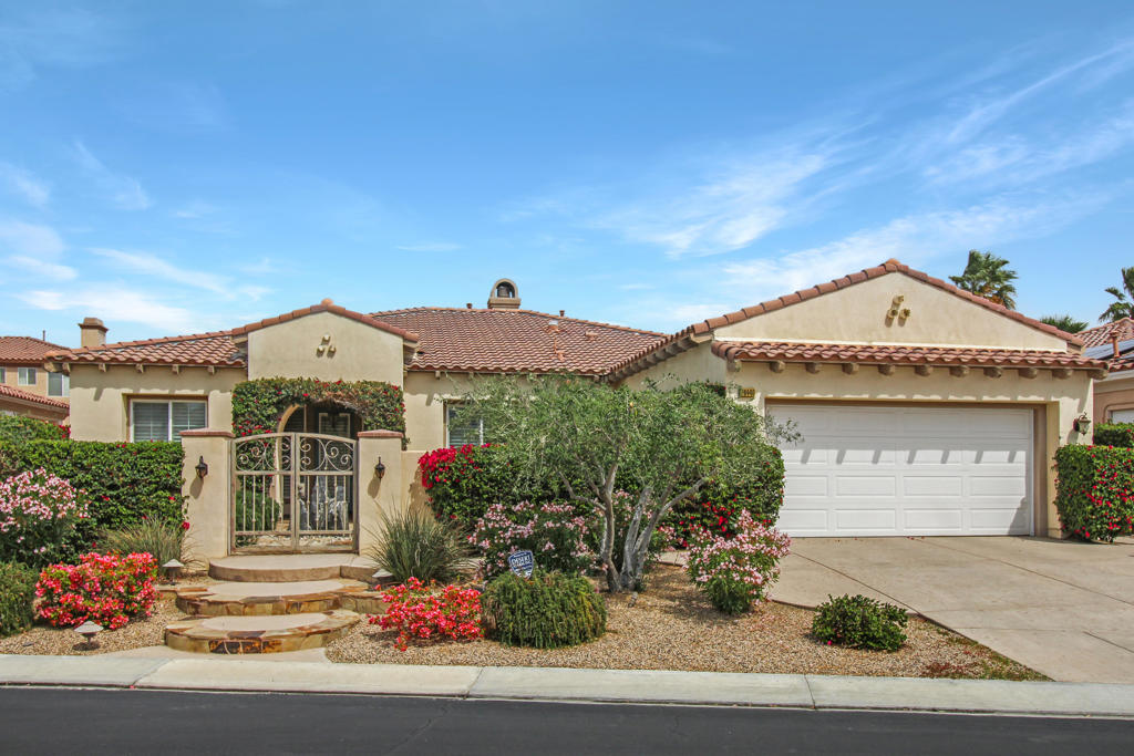 If you've been waiting for perfection, this is it! Located in the highly desirable community of La Quinta Del Oro, this stunning modern Mediterranean home offers luxury and convenience and is an entertainer's delight. Situated in a quiet cul-de-sac of just 4 homes ensure peace and privacy offering a picturesque and serene setting for its residents reflecting the pride of ownership that defines this neighborhood! This exquisite residence boasts a wide frontage, allowing the primary living and entertaining areas, as well as the primary suite and bath, to face the northern backyard. Tile Flooring throughout the home for ease in care, with new carpet in a portion of the great room and bedrooms. The open kitchen features granite countertops. two self-cleaning ovens, 5 burner gas cooktop with overhead vent, new refrigerator and plenty of cabinet space. Both counter bar top for dining as well as a spacious breakfast nook. Formal dining is right around the corner convenient to the kitchen. Plantation shutters throughout the house and a new A/C system installed. The outdoor areas of this home are equally impressive. A private courtyard at the front of the house is equipped with a fountain and stained glass door at the entry. The backyard features a solid covered patio with citrus trees lining the completely enclosed walled property perfect for your fur friends. Schedule a private tour and come see for yourself this exceptional home and start living the desert dream today!