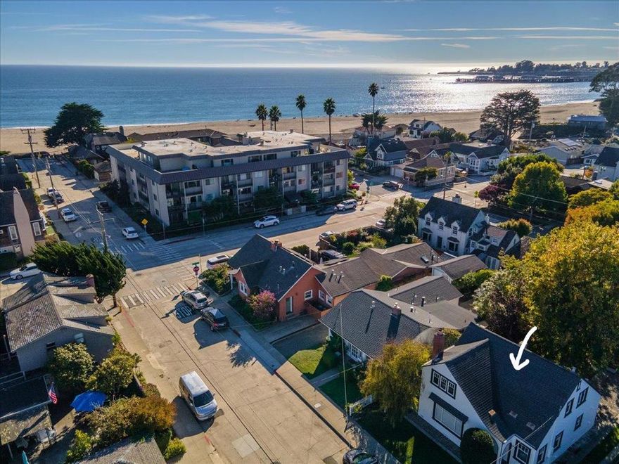 Classic 1920s beach home in the heart of a coveted Seabright neighborhood, just moments from the sand, surf and harbor. Rich in vintage charm with hardwood floors, leaded glass details and period built-ins, yet tastefully updated with a modernized kitchen and baths. Enjoy seamless flow from the spacious living room with a cozy fireplace to the dining area and sunny breakfast nook. A detached garage with a bonus room above offers possibilities as an art studio, office, or future ADU. Tucked on a picturesque street, this home captures the essence of Santa Cruz coastal living...warm, inviting and full of character.