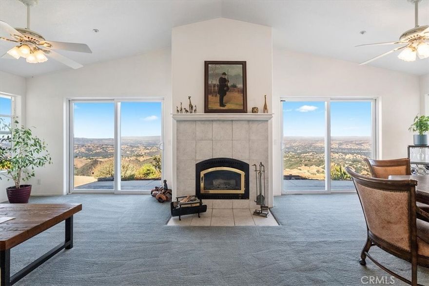 A rare opportunity — now priced $105,000 UNDER appraised value! Perched high above Atascadero, this hilltop retreat offers breathtaking mountainous views in every direction. To the west, enjoy peekaboo ocean views and magical sunsets; to the east, take in sights spanning from Paso Robles to Santa Margarita and beyond, with sparkling city lights that come alive every evening. Previously dubbed “The Falcon’s Nest,” this 3-bedroom, 2.5-bath home offers 2,011± sq. ft. of single story living space with large windows framing the stunning panoramic backdrop. The primary suite includes a roomy walk-in closet and a large soaking bathtub, while ceiling fans in every room add comfort throughout. Additional features include a dedicated laundry room, high ceilings, skylights, a wood-burning fireplace, gated entry, attached 2-car garage, RV potential, private well, and nearly off-grid capability — just add solar to fully disconnect from city utilities. Enjoy a rural setting just ~6.5 miles to Downtown Atascadero conveniences. Whether you envision this as a primary residence, weekend escape, or future legacy property, the combination of location, land, and views is truly unmatched.