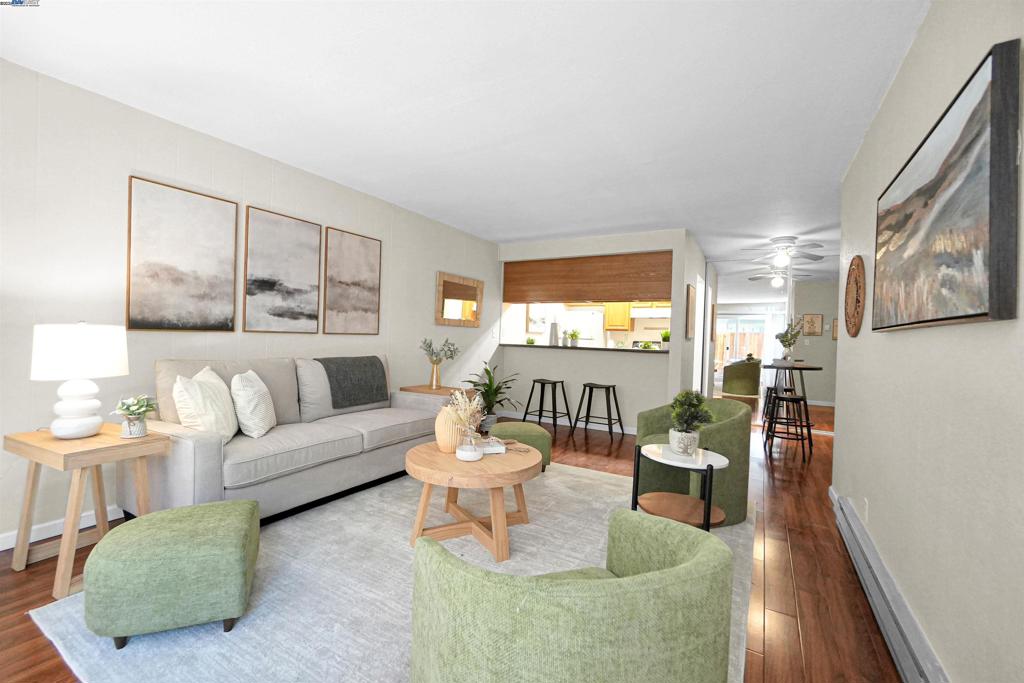 Perfect Starter Home! This stunning 1-bedroom, 1-bathroom ground-level corner unit is located in the well-maintained Wyndham Terrace community. Move-in ready with dual pane windows, updated flooring, and fresh paint throughout. Just steps away from the sparkling in-ground community pool, clubhouse, and gym. Enjoy added privacy, assigned parking, and secure gated access. You couldn't ask for a better location - minutes to major freeways, shopping, and more! Don’t miss this opportunity—schedule a showing today!