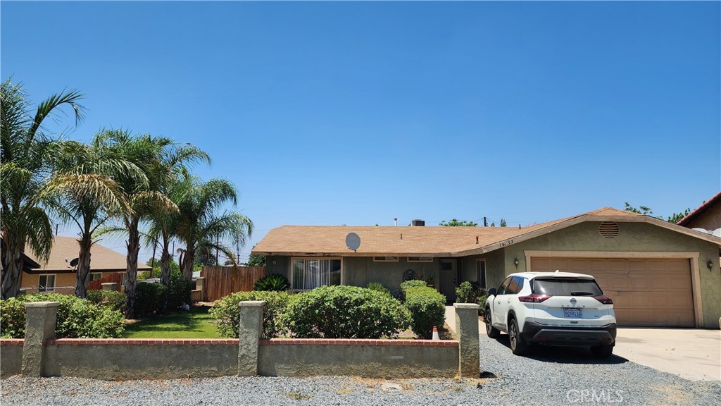 Come and take a look at this single story home for sale. Located in the heart of Moreno Valley close to the freeway and shopping centers. This beautiful home was recently upgraded with new cabinets, new interior paint and flooring. Total of 4 bedrooms and 2 full bathrooms. Recently remodeled kitchen with quartz counter tops and white shaker cabinets. Opens towards the living room with additional counter space and eating area big enough to fit 5+ stools. New laminate flooring with natural earth tone colors. The AC unit, Water heater and dual pane vinyl windows are relatively new. Sliding glass door exits from the living room towards the back yard covered patio. The yard is big and has several fruit and citrus trees. Attached two car garage with automatic opener. The laundry area is in the garage. Font yard with mature palm trees and artificial turf along with a block wall. Lets make this your home.
