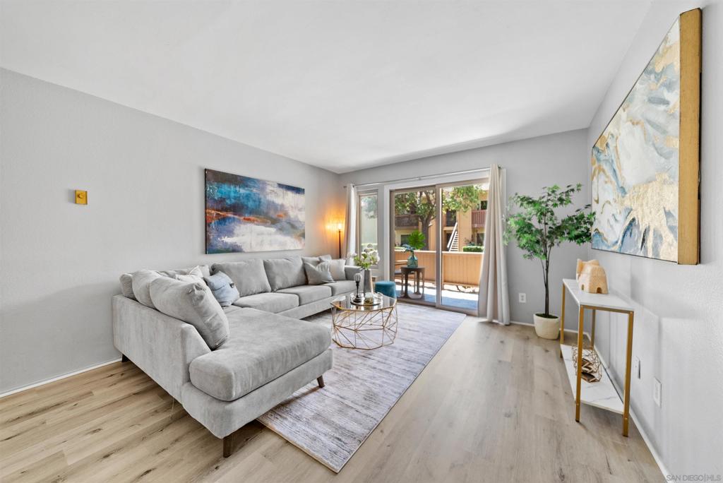 **ASSUMABLE LOAN** Welcome to one of the best-located units in Rancho Mission Villas in Mission Valley! This beautifully remodeled ground-floor 1BR/1BA condo is just steps from the pool, spa, clubhouse, and community laundry. Features include fresh paint, stylish LVP flooring, a private patio with peaceful fountain views, and exterior storage. Prime location near the Trolley, Snapdragon Stadium, shopping, dining, 24-Hour Fitness, and the historic San Diego Mission. Enjoy resort-style amenities including 2 pools, 2 spas, sauna, fitness center, tennis courts, BBQ areas, designated dog area, and clubhouse. Comes with 1 reserved parking space and 2 guest parking passes. FHA & VA approved complex!
