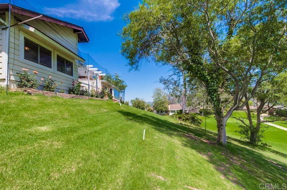 Nestled in the Country Greens at Lake San Marcos. This Executive home provides tranquility as well as functionality. Appointed with soaring cathedral ceilings, warm inviting fireplace, private patio retreat. Bonus office space overlooking the fairway. Entertainers' kitchen, oversized primary bedroom with ample closets. Guest bedroom. Hardwood flooring, Granite counters. Laundry room, Ample storage space. Access to clubhouse, pool, pickleball, tennis and much more