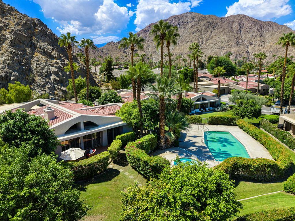 Available for Nov. 25- Feb. 2026. Leased for March. Charming 3-Bedroom, 3-Bath Home in coveted Indian Wells. Nestled behind the gates of Mountain Cove, this picturesque 3-bedroom, 3-bath residence offers the perfect blend of comfort. Tucked close to the stunning mountains, the home welcomes you through a private courtyard patio and double French doors. As you enter, you'll find a Spacious Living Room with views out to the patio, vaulted wood beam ceilings, timeless Saltillo tile flooring, a cozy fireplace and large Flat Screen TV--perfect for relaxing evenings. Plantation shutters are throughout and nearly every window offers breathtaking mountain views. The Chef's Kitchen with Granite Counters features a charming Breakfast Nook, ideal for casual dining. The adjacent Dining Room comfortably seats 6. The Primary bedroom boasts a King-sized bed and TV, spa Tub and Separate Shower. 2 guest suites each feature Queen beds, en-suite baths, and each has its own sliders leading to the private patio--perfect for guests or family.Additional amenities include an in-home washer and dryer and an attached two-car garage. A large private Patio that's ideal for entertaining. The community Pool and Spa are just steps away. Located close to the Indian Wells Tennis Garden, Shopping on El Paseo, and Dining.