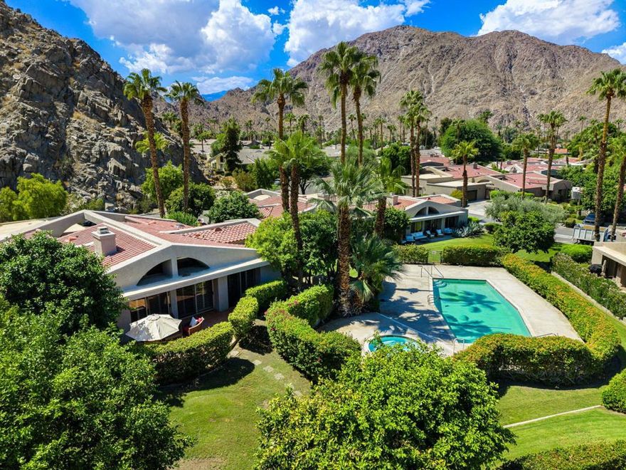 Available for Nov. 25- Feb. 2026. Leased for March. Charming 3-Bedroom, 3-Bath Home in coveted Indian Wells. Nestled behind the gates of Mountain Cove, this picturesque 3-bedroom, 3-bath residence offers the perfect blend of comfort. Tucked close to the stunning mountains, the home welcomes you through a private courtyard patio and double French doors. As you enter, you'll find a Spacious Living Room with views out to the patio, vaulted wood beam ceilings, timeless Saltillo tile flooring, a cozy fireplace and large Flat Screen TV--perfect for relaxing evenings. Plantation shutters are throughout and nearly every window offers breathtaking mountain views. The Chef's Kitchen with Granite Counters features a charming Breakfast Nook, ideal for casual dining. The adjacent Dining Room comfortably seats 6. The Primary bedroom boasts a King-sized bed and TV, spa Tub and Separate Shower. 2 guest suites each feature Queen beds, en-suite baths, and each has its own sliders leading to the private patio--perfect for guests or family.Additional amenities include an in-home washer and dryer and an attached two-car garage. A large private Patio that's ideal for entertaining. The community Pool and Spa are just steps away. Located close to the Indian Wells Tennis Garden, Shopping on El Paseo, and Dining.