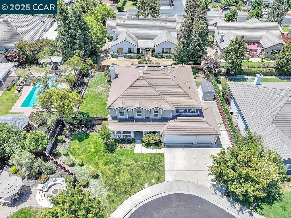 Executive home with over 4,000. Rooms galore and perfect for multigenerational families with 2 bedrooms and 1 full bath downstairs. Your clients will love you for introducing this home to them. End of Court location too, huge lot, no HOA! Stunning residence and thoughtfully designed living. This home accommodates all your needs with 5/6 bedrooms, 3 full baths and an incredible home office. The convenience of a ground level bedroom (s) and bathroom is perfect for guests or 2nd families. The massive bonus room is perfect for even more bedrooms, game room, home theater, or additional living space. This home also offers newer high efficiency heat/ac and paid solar with no loan balance. Nestled at the end of a quiet court, the home boasts a 1/4 acre lot, providing both privacy and tons of space. Ample side yard area is gated with room to park all your toys.