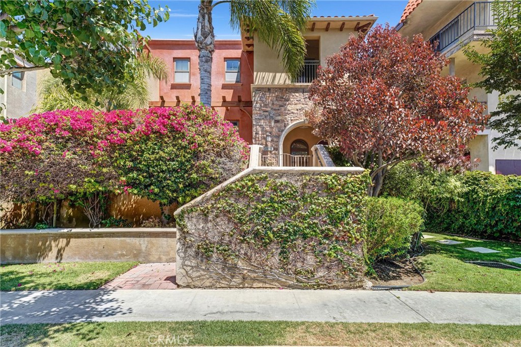 Stylish, spacious, and conveniently located—this Tuscan-inspired townhome offers exceptional comfort and charm in the heart of Torrance. Available for lease, this 3-bedroom residence features a private front yard, multiple balconies, and a beautifully designed interior that blends elegance with practicality. The generous floor plan includes oversized living and dining rooms, perfect for relaxing or entertaining. A chef-worthy kitchen features granite countertops, custom cabinetry, a walk-in pantry, and plenty of counter space. Upstairs, all three bedrooms provide privacy and natural light, with the primary suite offering a walk-in closet, jacuzzi tub, and separate shower. Additional amenities include central A/C and heat, washer and dryer, a 2-car garage plus a 2-car carport, and lawn care and trash service provided by the HOA. Set in a quiet, well-maintained community near parks, local shops, award-winning schools, and the Del Amo Fashion Center—with easy access to freeways and the beach—this is a rare lease opportunity in a desirable South Bay location.