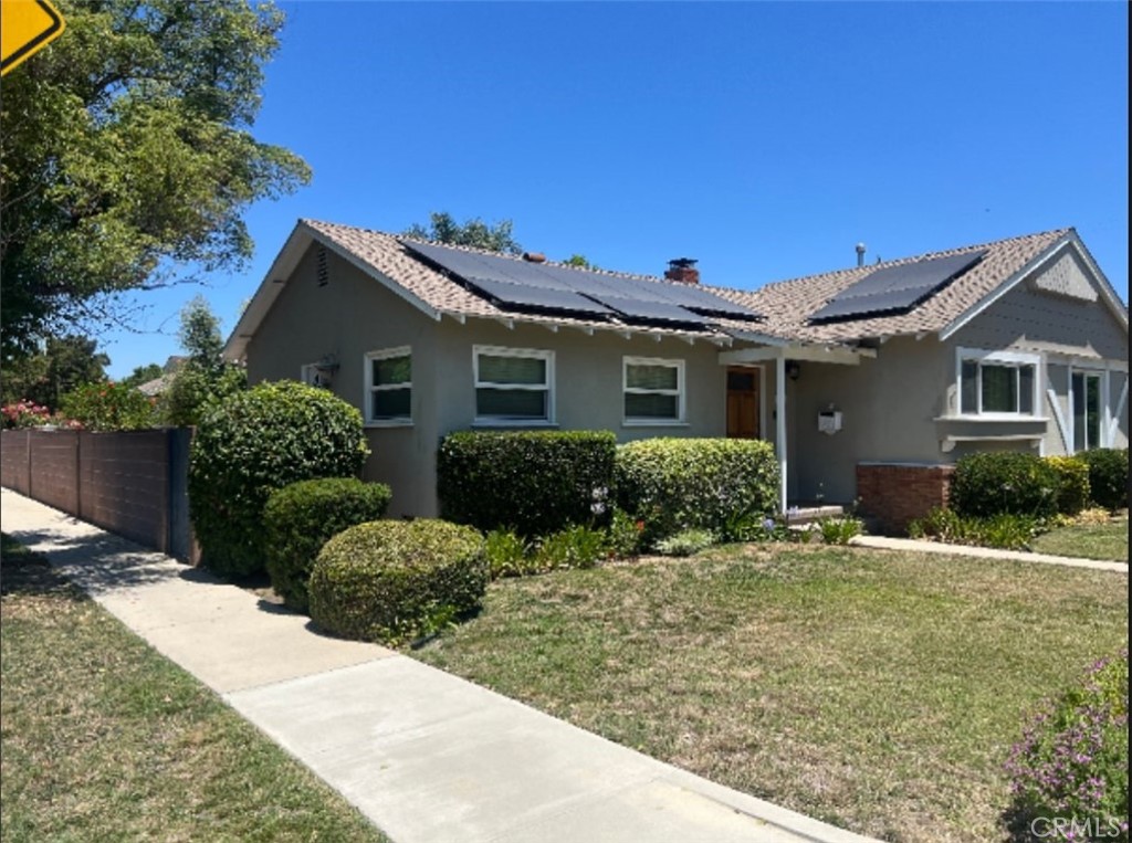 This light-filled home sits on a spacious corner lot with full block walls for privacy. The open kitchen features granite countertops, stainless steel appliances, and warm birch cabinets. Recent upgrades include a newer HVAC system, dual-pane windows, and a new roof.
The refinished hardwood floors flow throughout, complementing the roomy living area with a cozy wood-burning fireplace. With 3 bedrooms, 2 baths, 1313 sq ft home has a porch with direct access to the backyard, this home is both practical and inviting.
Outside, enjoy a peaceful brick patio overlooking a saltwater pool, fire pit area. The detached 2-car garage and double gates off the driveway provide easy backyard access. A perfect blend of comfort and convenience!