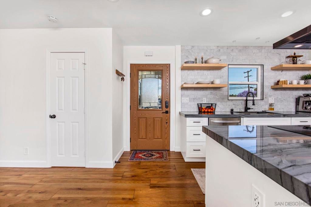 Photo of 6875 Estrella Ave Ave, San Diego, CA 92120 (MLS # 260009685SD)