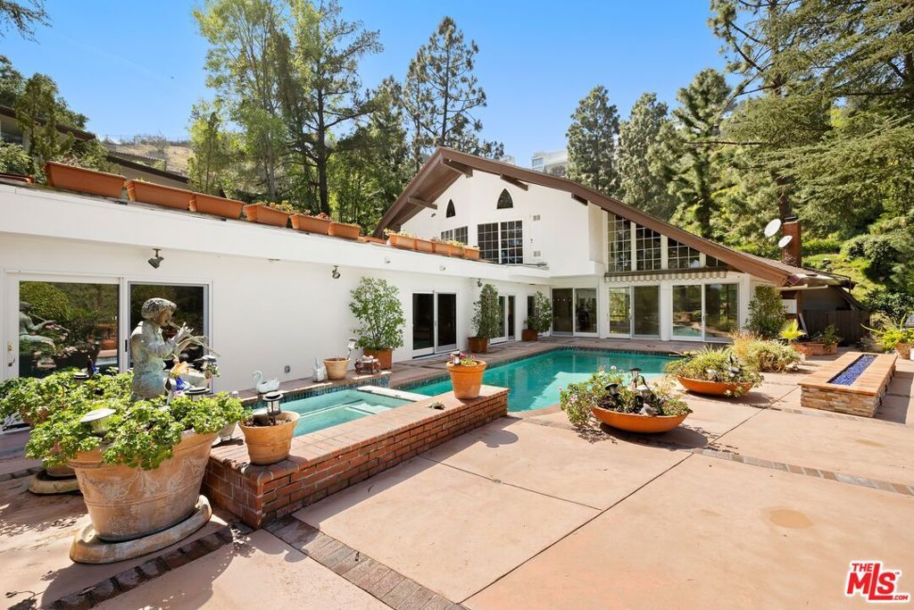 Photo of 1727 Stone Canyon Road, Los Angeles, CA 90077 (MLS # 26670353)