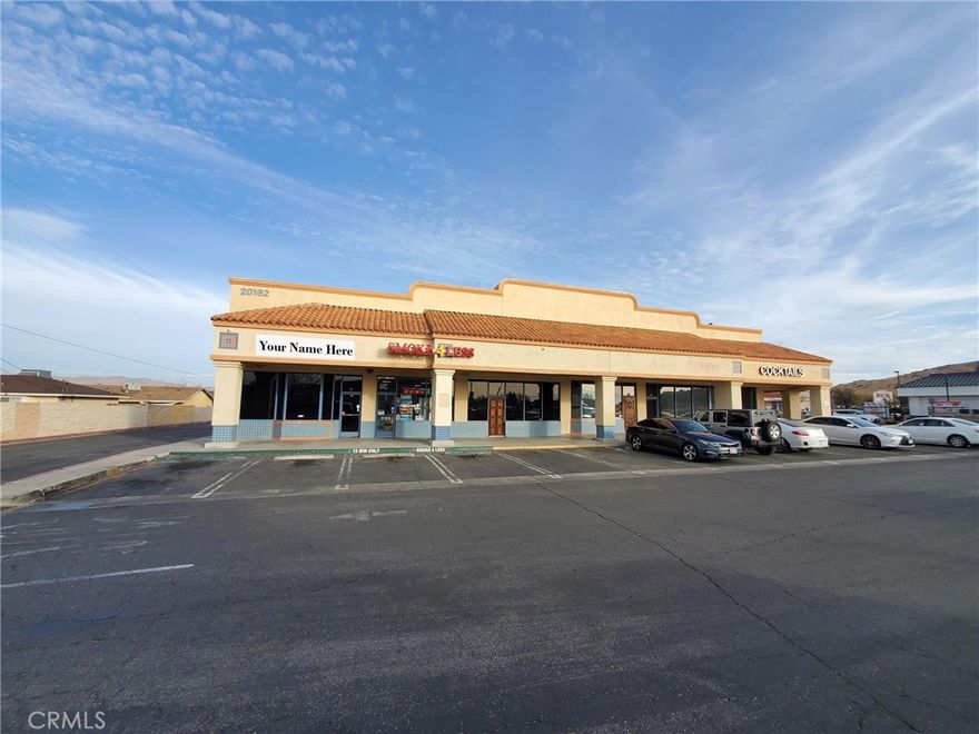 This prime endcap retail unit offers a spacious open floor plan with sleek epoxied concrete flooring, abundant lighting, and a well-appointed in-suite restroom. A small office/storage room provides added functionality, making this space ideal for a barbershop, salon, boutique, retail store, or professional office. Located in a thriving shopping center with high visibility and foot traffic, this unit is surrounded by popular businesses, including Viva Maria’s, Jack in the Box, Domino’s Pizza, The Gym, Organic Tea House, and Smoke 4 Less.
