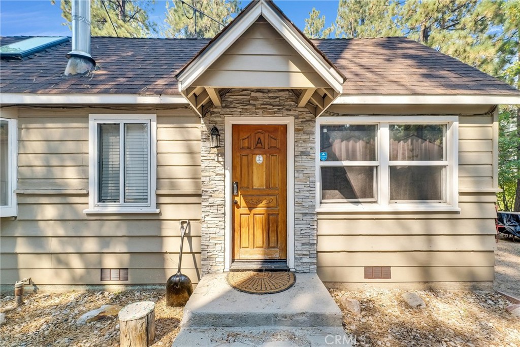 A fantastic TWO UNIT opportunity, each with two bedrooms, their own entrance, and amenities, are ideal for hosting multiple groups or generating consistent rental income. Located in a prime spot, just minutes from Big Bear Lake’s attractions, hiking trails, and ski resorts, this property is a top pick for vacationers year-round. Each unit features comfortable living spaces, modern kitchens, and updated bathrooms—ready to impress guests. The property has recently undergone extensive updates, including a brand new $30,000 roof, with three layers stripped down, all new wood, and metal flashing installed. The exterior has been upgraded with Hardy board around the perimeter to address termites and warped wood, with fresh paint to match. Additionally, the newly updated spa, serviced by Olson Spa, is fully operational and ready for guests to enjoy. Both units boast new wood-burning fireplaces with metal chimneys, adding a cozy touch to the mountain retreat. Convenience and security have also been enhanced with electric locks that integrate with an app and camera system, making check-ins seamless. Other upgrades include a washer and dryer in the breezeway, new walls and insulation where a previous leak was repaired, and fully painted, freshly renovated interiors for both units. Surrounded by towering pines, the property offers a serene setting for visitors to relax, complete with space for outdoor dining and lounging. Ample parking accommodates multiple vehicles, essential for larger rental groups.
Capitalize on Big Bear Lake’s booming rental market with this versatile property—perfect for generating passive income while enjoying everything this mountain paradise has to offer.