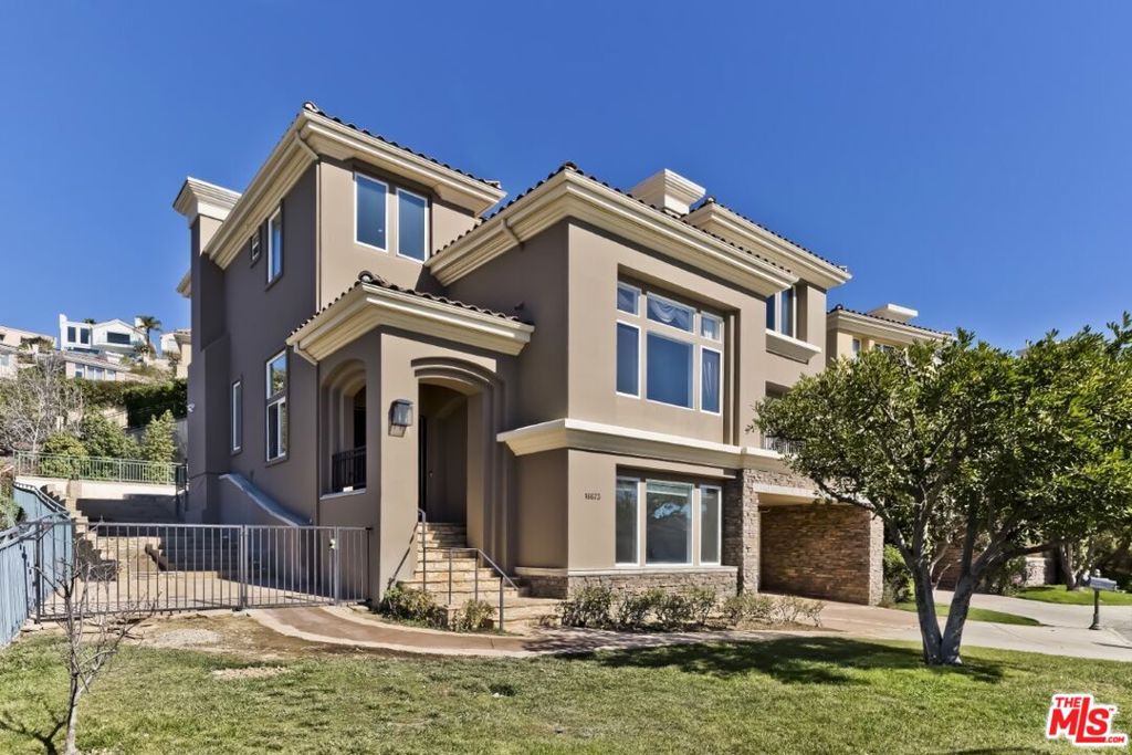 Luxurious Multi-Level Home for Lease in Palisades Highlands: Experience the epitome of luxury in this stunning multi-level residence located in the prestigious Peninsula community of Palisades Highlands. This exceptional 5-bedroom, 5-bath home spans approximately 4,500 sq. ft. and is situated at the end of a tranquil cul-de-sac, offering unparalleled privacy and breathtaking ocean and mountain views. Spacious and Elegant Living Areas: Designed with comfort and elegance in mind, the expansive living spaces are perfect for both relaxation and entertainment. Scenic Vistas: Enjoy stunning ocean and mountain views from multiple vantage points throughout the home. Exclusive Community Amenities: Access the private multi-acre Summit Club, which includes a pool, spa, gym, tennis courts, playground, and dog park. Prime Location: Conveniently close to hiking trails, beaches, and the Caruso Village shopping center, providing a perfect blend of luxury and convenience. Embrace a serene retreat with modern conveniences in this exceptional lease opportunity.