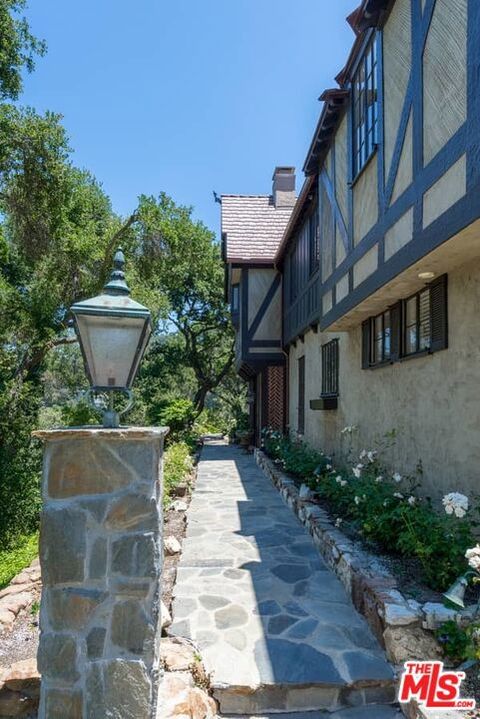 Tiny photo for 1957 MANDEVILLE CANYON Road, Los Angeles, CA 90049 (MLS # 25615483)