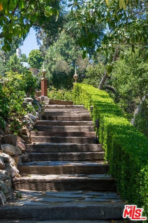 Tiny photo for 1957 MANDEVILLE CANYON Road, Los Angeles, CA 90049 (MLS # 25615483)