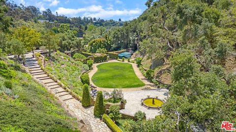 Tiny photo for 1957 MANDEVILLE CANYON Road, Los Angeles, CA 90049 (MLS # 25615483)