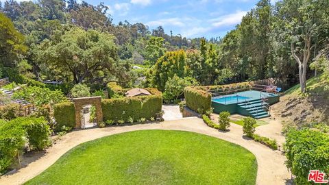 Tiny photo for 1957 MANDEVILLE CANYON Road, Los Angeles, CA 90049 (MLS # 25615483)